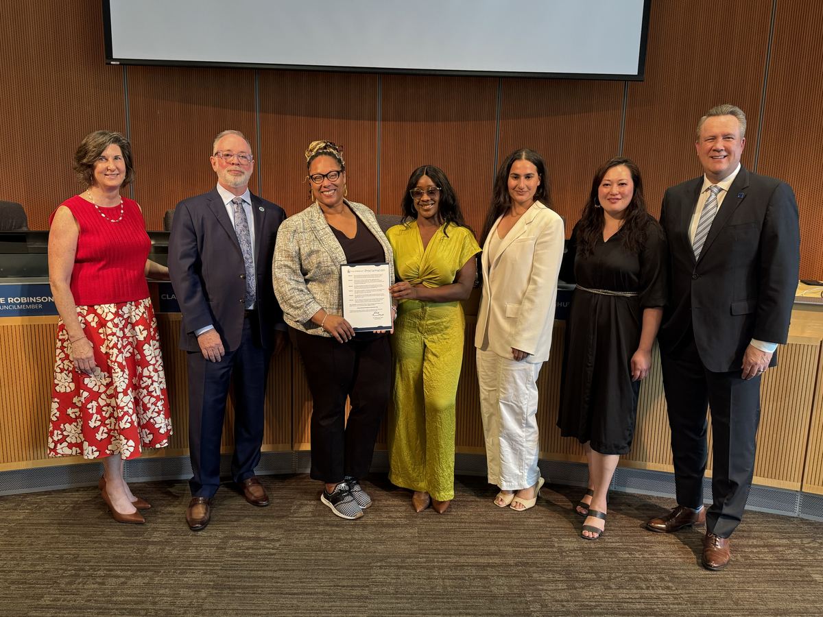 Katoya R. Palmer accepting the Black Business Month proclamation from the Bellevue City Council on August 4, 2026