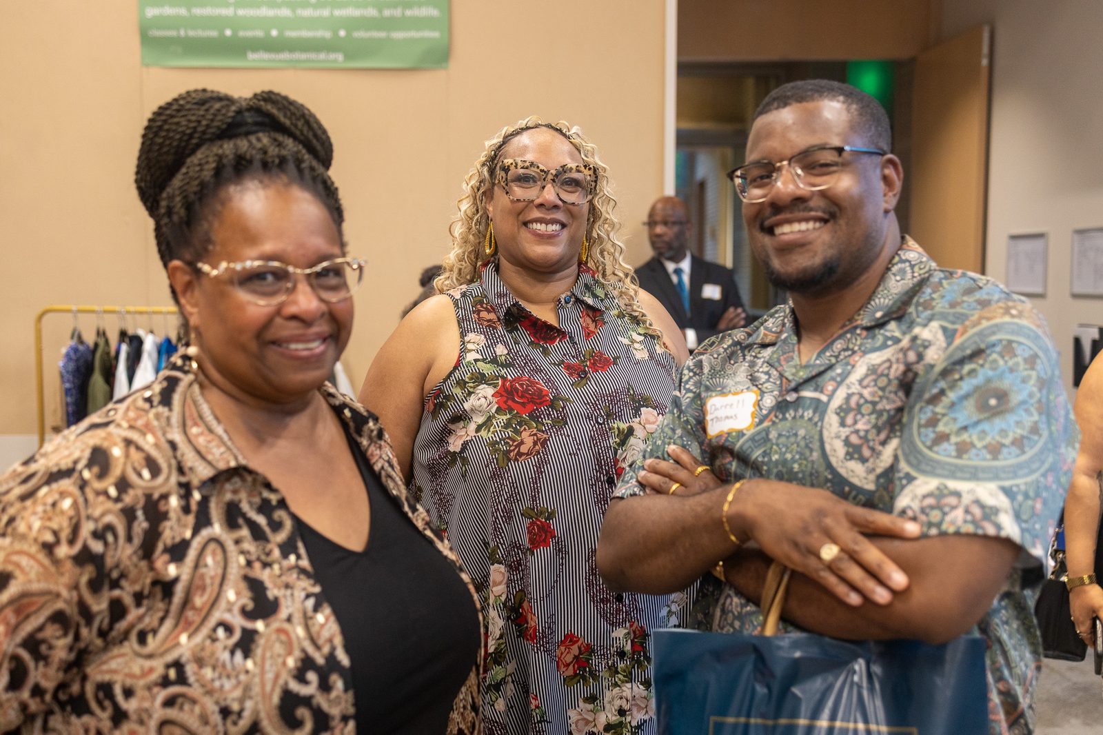Katoya Palmer with her mother Terri and her cousin Ken Roy, who taught her to pitch
